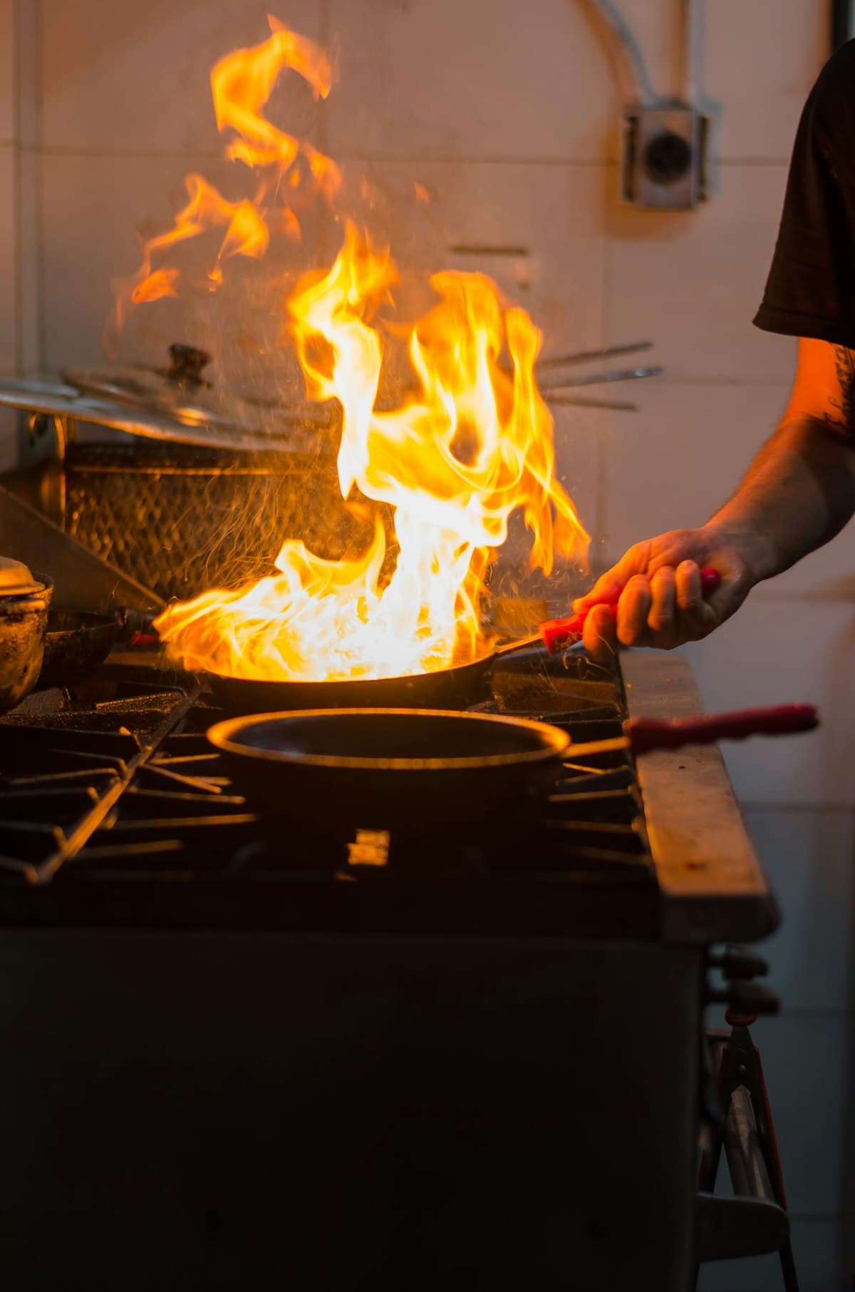 Wok en flammes pendant le service du soir